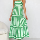 Vestido midi con tirantes, espalda abierta, rayas, estampado elegante y bolsillos.
