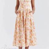 Encantador vestido midi de patchwork estampado con tirantes con cordones