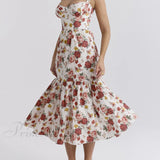 Vestidos midi florales sin espalda en un estilo suave y picante.