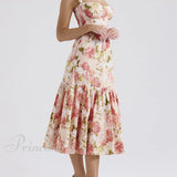 Vestidos midi florales sin espalda en un estilo suave y picante.