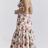 Vestidos midi florales sin espalda en un estilo suave y picante.