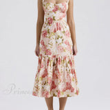 Vestidos midi florales sin espalda en un estilo suave y picante.