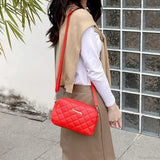 Bolso de hombro para cámara con pompones bordados