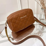 Bolso de hombro para cámara con pompones bordados