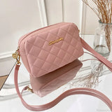 Bolso de hombro para cámara con pompones bordados