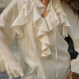 Blusa de doble capa con volantes y lazo en Tencel