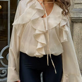 Blusa de doble capa con volantes y lazo en Tencel