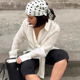 Blusa asimétrica transparente de manga larga en Tencel