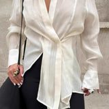 Blusa asimétrica transparente de manga larga en Tencel