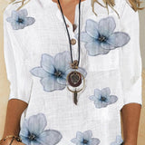 Blusa de mujer – Fibras naturales – Corte holgado – Cuello en pico – Estampado floral – Manga corta