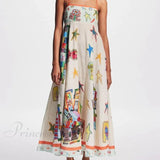 Vestido midi largo y elegante con tirantes y un estampado de grafiti único.
