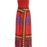 Vestido midi floral con hombros descubiertos adornado con una palmera única y encantadora.
