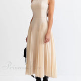 Vestido midi sin mangas único y encantador con paneles plisados.