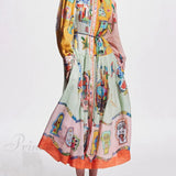 Vestido camisero midi con un estampado de bloques de color único, mangas abullonadas y cinturón estilo globo.