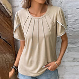 Jenny - Elegante blusa de diseño en suave algodón.