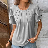 Jenny - Elegante blusa de diseño en suave algodón.