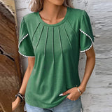 Jenny - Elegante blusa de diseño en suave algodón.