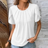 Jenny - Elegante blusa de diseño en suave algodón.