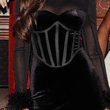 Vestido de patchwork de terciopelo con abertura y dobladillo esponjoso.