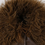 Chaqueta vintage con cuello polar y paneles de cuero.