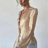 Blusa vintage de manga larga y escote en pico