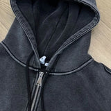 Sudadera corta con capucha abierta al frente, con bordado 3D y lavado descolorido.