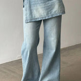 Vaqueros de tiro alto, asimétricos y de pierna ancha en denim lavado