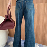 Vaqueros bootcut de tiro alto y pierna ancha en lavado descolorido
