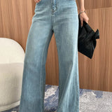 Vaqueros bootcut de tiro alto y pierna ancha en lavado descolorido