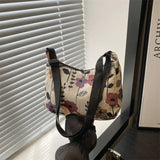 Bolso bandolera de tela con estampado invernal en forma de media luna