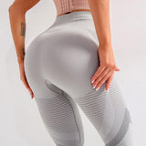 Leggings de fitness elegantes para mujer: ajustados, elásticos y transpirables.
