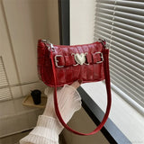 Bolso bandolera de piel color melocotón con forma de corazón Y2K