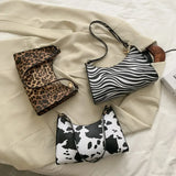Bolso de hombro de piel sintética con estampado de cebra