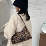 Bolso de hombro de piel sintética con estampado de cebra