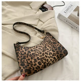 Bolso de hombro de piel sintética con estampado de cebra
